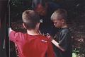 Richard helps a student read a bore sample to determine tree age